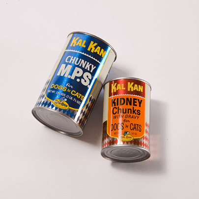Two different cans of Kal Kan pet food from 1968